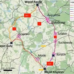 Mapa drogowa wzdłuż Via Carpatia, pokazująca warianty tras S61 i S19, z zaznaczonymi węzłami i miejscowościami jak Augustów, Grajewo, Mońki.