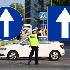 Policjant kieruje ruchem, a znaki nakazu jazdy prosto wskazują drogę.