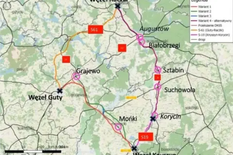 Mapa drogowa wzdłuż Via Carpatia, pokazująca warianty tras S61 i S19, z zaznaczonymi węzłami i miejscowościami jak Augustów, Grajewo, Mońki.