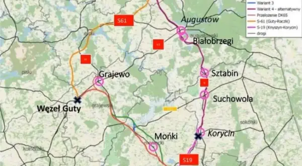 Mapa drogowa wzdłuż Via Carpatia, pokazująca warianty tras S61 i S19, z zaznaczonymi węzłami i miejscowościami jak Augustów, Grajewo, Mońki.