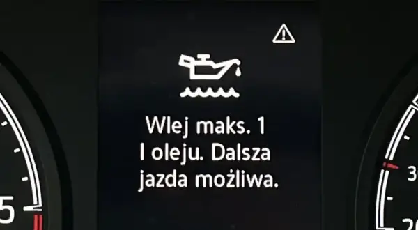Na desce rozdzielczej świeci się kontrolka oleju. Komunikat informuje: "Wlej maks. 1 l oleju. Dalsza jazda możliwa.