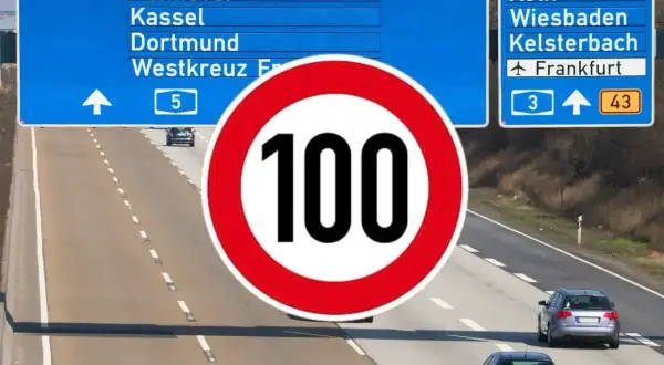 Niemiecki autobahn z tablicami kierunkowymi na Hanower, Kolonię i Frankfurt. Ograniczenie prędkości do 100 km/h.
